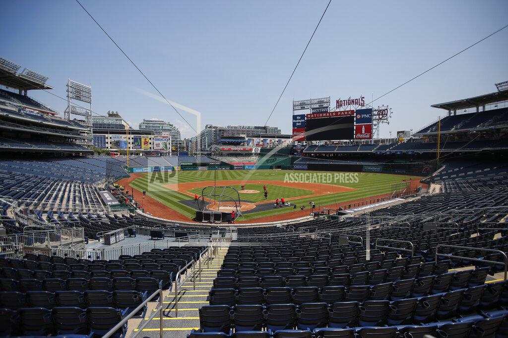 Carolyn Kaster An empty Nationals Stadium is viewed during a Washington Nationals baseball training camp workout Sunday, July 5, 2020, in Washington. (AP Photo/Carolyn Kaster)