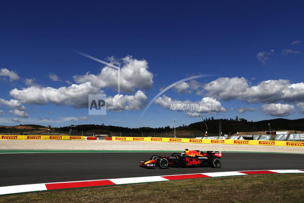 Manu Fernandez Red Bull driver Max Verstappen of the Netherlands takes a curve during the first free practice session ahead of the Portugal Formula One Grand Prix at the Algarve International Circuit near Portimao, Portugal, Friday, April 30, 2021. The Portugal Grand Prix will be held on Sunday. (AP Photo/Manu Fernandez)