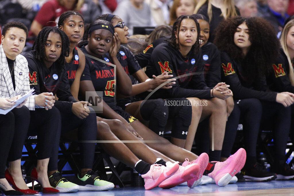 Young Kwak Maryland players watch from the bench late in the second half of a college basketball game against Stanford in the Sweet 16 round of the NCAA tournament, Friday, March 25, 2022, in Spokane, Wash. Stanford won 72-66. (AP Photo/Young Kwak)