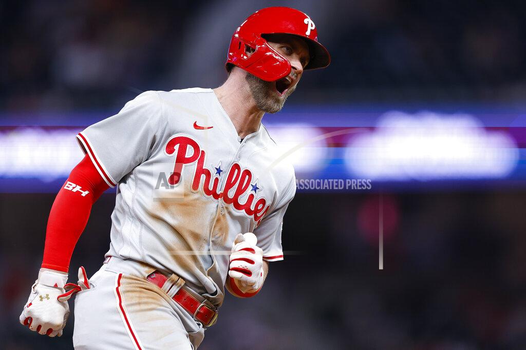 Todd Kirkland Philadelphia Phillies Bryce Harper reacts after hitting a two run home run in the ninth inning of a baseball game against the Atlanta Braves, Tuesday, May 24, 2022, in Atlanta. (AP Photo/Todd Kirkland)