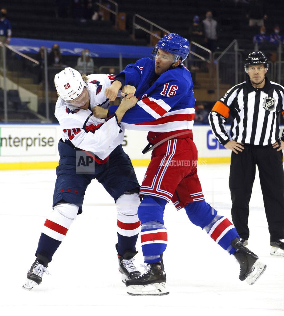 Bruce Bennett New York Rangers' Ryan Strome (16) fights with Washington Capitals' Lars Eller (20) during the first period of an NHL hockey game Wednesday, May 5, 2021, in New York. (Bruce Bennett/Pool Photo via AP)