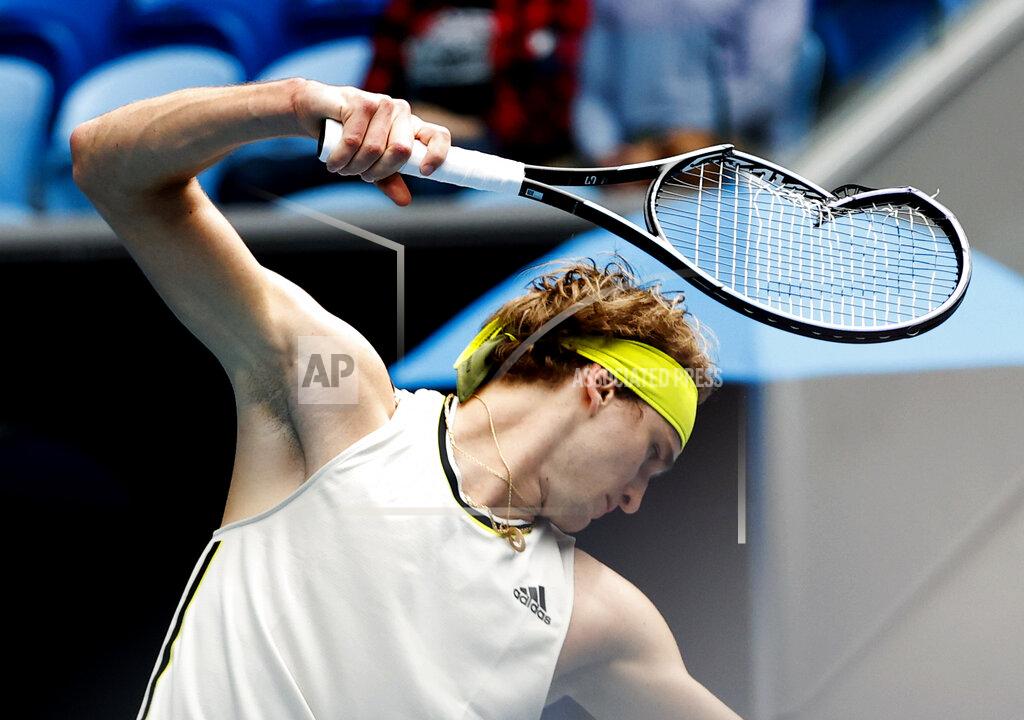 Rick Rycroft Germany's Alexander Zverev smashes his racket in frustration during his first round match against United States' Marcos Giron at the Australian Open tennis championship in Melbourne, Australia, Monday, Feb. 8, 2021.(AP Photo/Rick Rycroft)