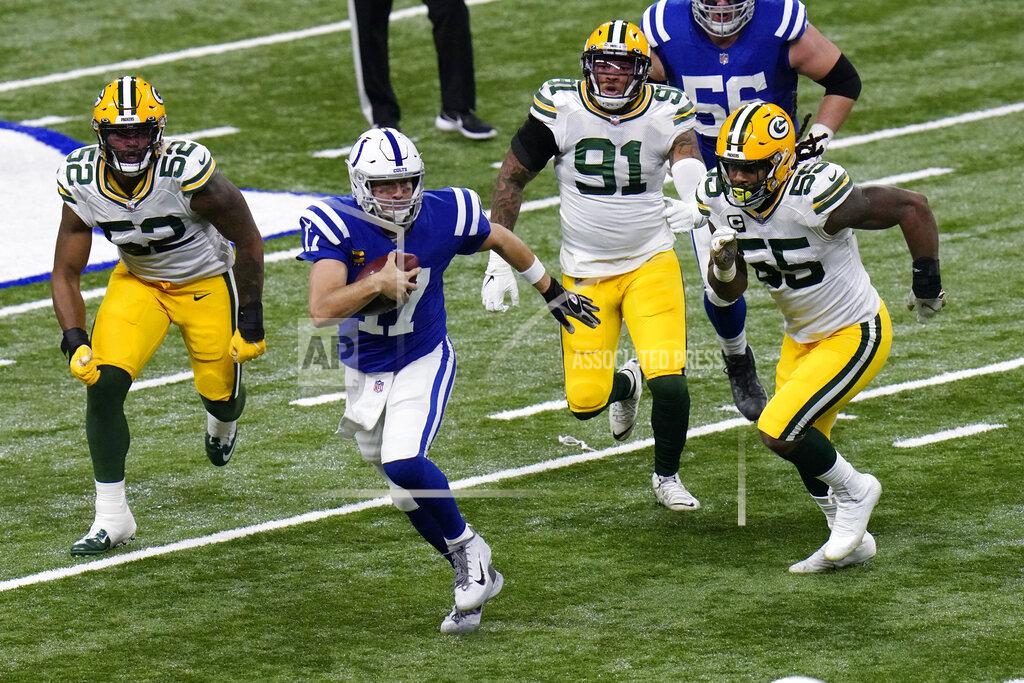 Aj Mast Indianapolis Colts quarterback Philip Rivers (17) runs during the first half of an NFL football game against the Green Bay Packers, Sunday, Nov. 22, 2020, in Indianapolis. (AP Photo/AJ Mast)