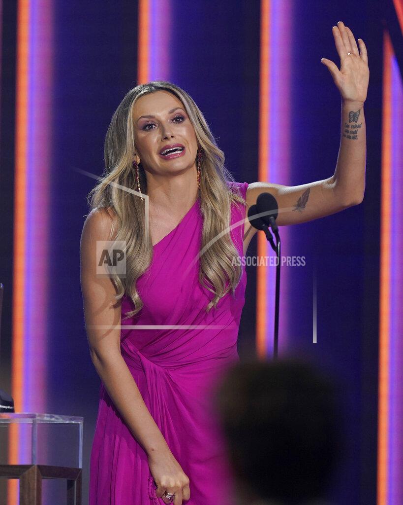 Mark Humphrey Carly Pearce accepts the award for single of the year for "I Hope You're Happy Now" at the 56th annual Academy of Country Music Awards on Sunday, April 18, 2021, at the Grand Ole Opry in Nashville, Tenn. (AP Photo/Mark Humphrey)