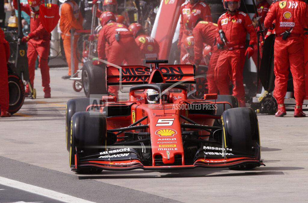 Ferrari driver Sebastian Vettel, of Germany, leaves the pits during the Brazilian Formula One Grand Prix at the Interlagos race track in Sao Paulo, Brazil, Sunday, Nov. 17, 2019. (Amanda Perobelli/Pool Photo via AP)