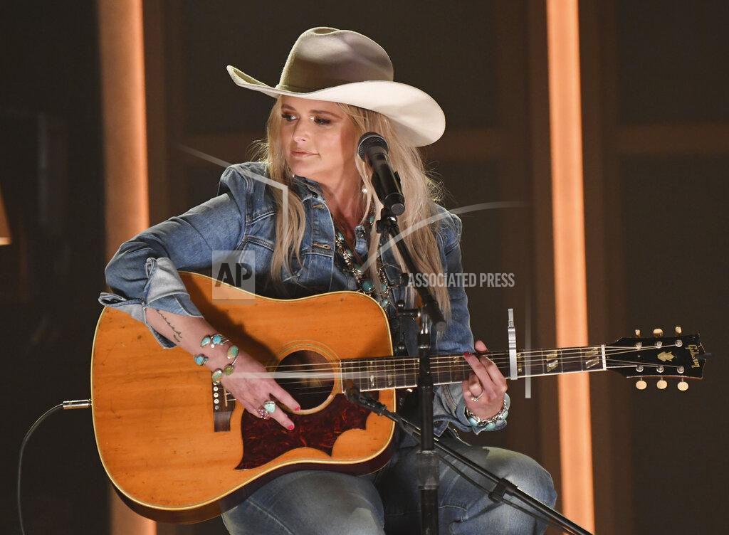 Amy Harris Miranda Lambert, center, performs "In His Arms" at the 56th annual Academy of Country Music Awards on Sunday, April 18, 2021, at the Ryman Auditorium in Nashville, Tenn. (Photo by Amy Harris/Invision/AP)
