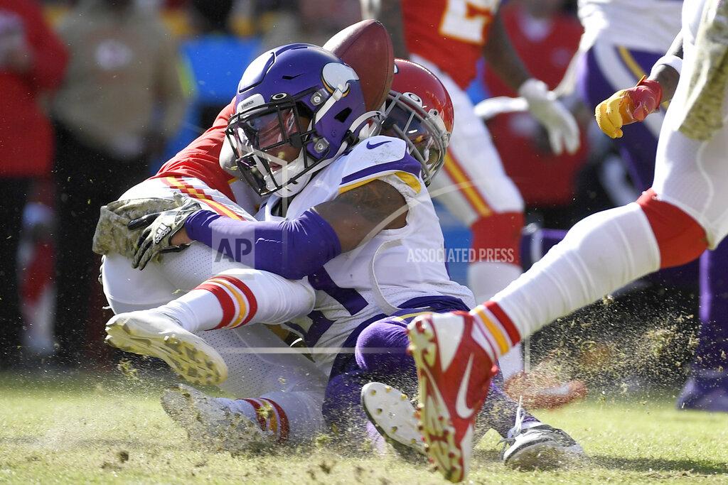 Reed Hoffmann Kansas City Chiefs wide receiver Mecole Hardman, rear, fumbles the ball for a turnover after a hit by Minnesota Vikings cornerback Mike Hughes (21) during the second half of an NFL football game in Kansas City, Mo., Sunday, Nov. 3, 2019. (AP Photo/Reed Hoffmann)