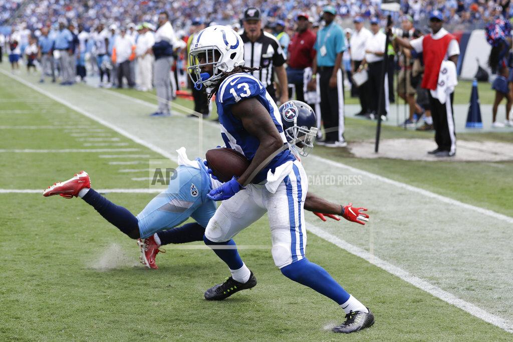 James Kenney Indianapolis Colts wide receiver T.Y. Hilton (13) catches a touchdown pass as he is defended by Tennessee Titans cornerback Malcolm Butler in the second half of an NFL football game Sunday, Sept. 15, 2019, in Nashville, Tenn. (AP Photo/James Kenney)