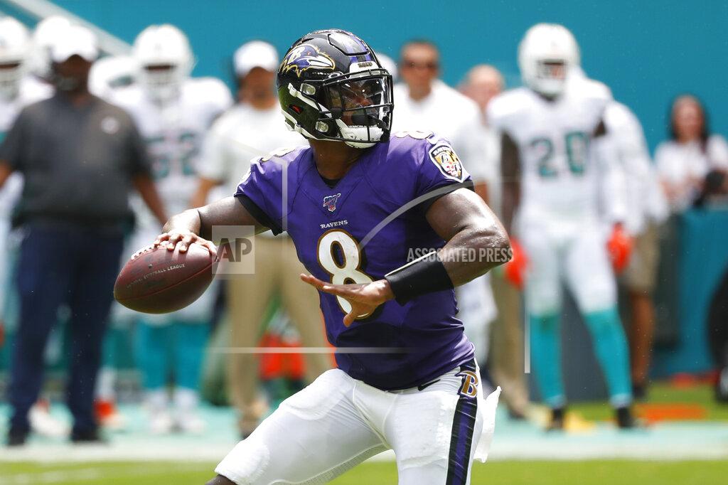 Wilfredo Lee Baltimore Ravens quarterback Lamar Jackson (8) looks to pass, during the first half at an NFL football game against the Miami Dolphins, Sunday, Sept. 8, 2019, in Miami Gardens, Fla. (AP Photo/Wilfredo Lee)