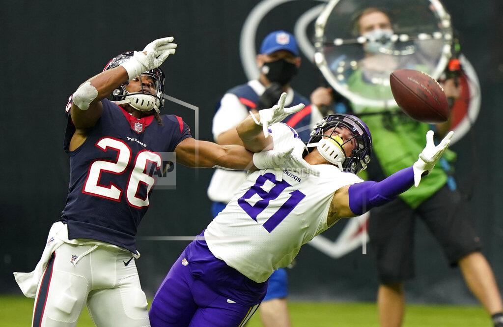 David J. Phillip Houston Texans cornerback Vernon Hargreaves III (26) breaks up a pass intended for Minnesota Vikings wide receiver Bisi Johnson (81) during the first half of an NFL football game Sunday, Oct. 4, 2020, in Houston. (AP Photo/David J. Phillip)