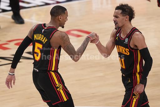 Young scores 32, Hawks beat Celtics 130-122 to close to... - Vimarsana News
