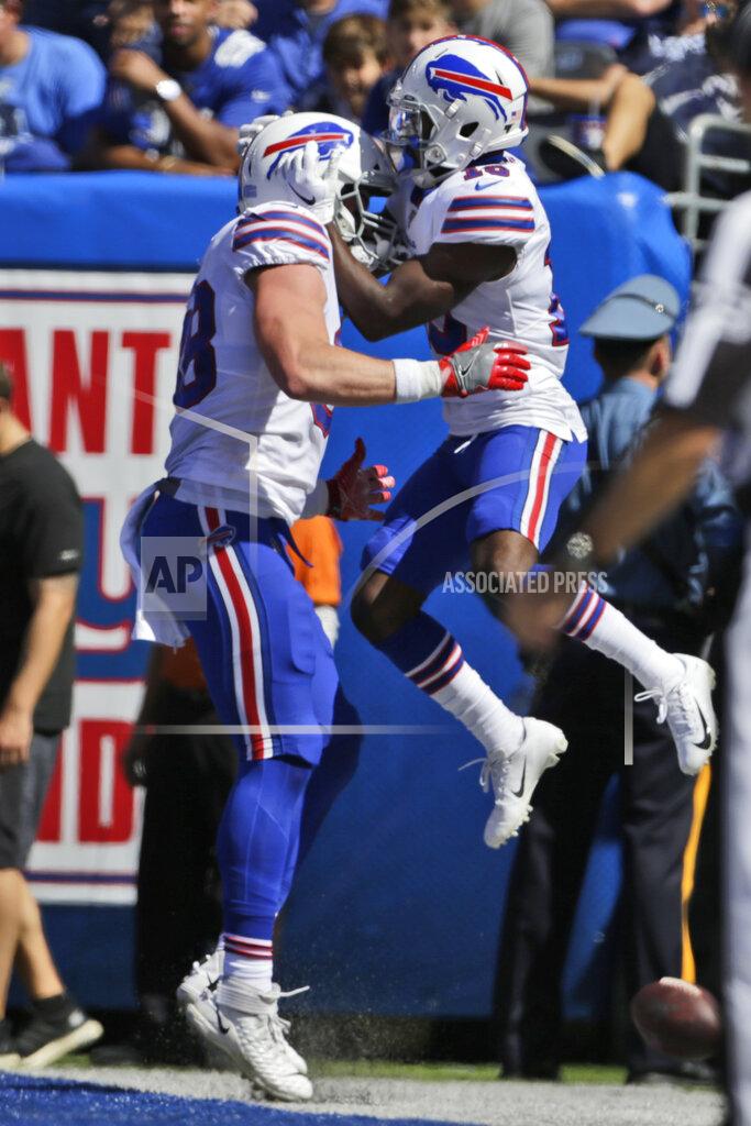 Adam Hunger Buffalo Bills' Isaiah McKenzie, right, celebrates his touchdown with Dawson Knox during the first half of an NFL football game against the New York Giants, Sunday, Sept. 15, 2019, in East Rutherford, N.J. (AP Photo/Adam Hunger)