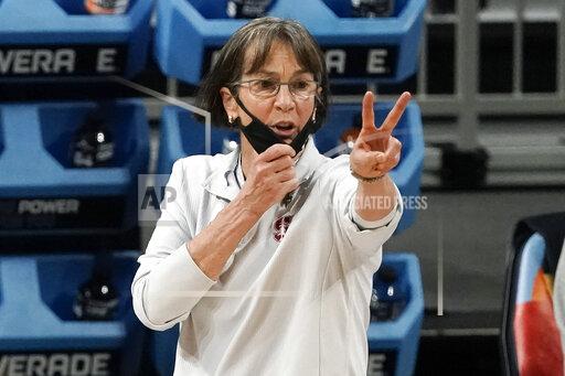 FILE - In this April 4, 2021, file photo, Stanford head coach Tara VanDerveer directs her team during the first half of the championship game against Arizona in the women's Final Four NCAA college basketball tournament at the Alamodome in San Antonio. Coaches and players throughout the Pac-12 knew well before last season's NCAA Tournament they had one of the most talented conferences in the country. "Last year feels a little bit like a blur," Stanford coach Tara VanDerveer said. "But we got through a lot, and congratulations to the Pac-12 to have two teams in the championship game and six teams in the tournament. And we're going to be greedy, go for more next year." (AP Photo/Morry Gash, File)
