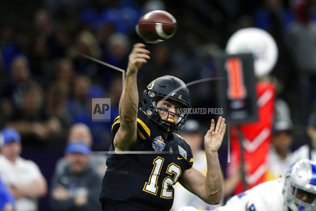 Gerald Herbert FILE - In this Dec. 15, 2018, file photo, Appalachian State quarterback Zac Thomas (12) passes in the first half of the New Orleans Bowl NCAA college football game against Middle Tennessee in New Orleans. Thomas returns to the defending champion Mountaineers after ranking second in the Sun Belt Conference in total yards last season with 2,543. (AP Photo/Gerald Herbert, File)