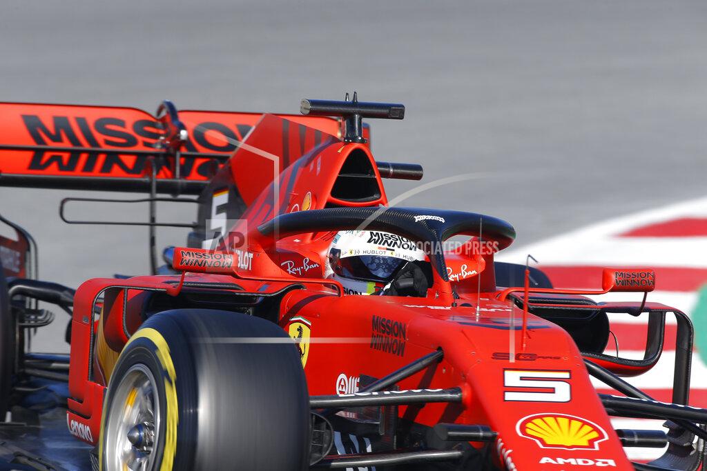 Joan Monfort Ferrari driver Sebastian Vettel of Germany steers his car during a Formula One pre-season testing session at the Barcelona Catalunya racetrack in Montmelo, outside Barcelona, Spain, Wednesday, Feb. 27, 2019. (AP Photo/Joan Monfort)
