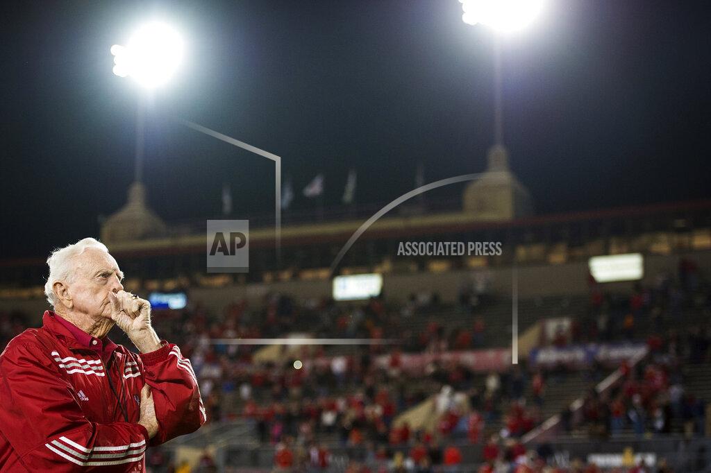 Smiley N. Pool FILE - In this Nov. 24, 2012, file photo, former Houston coach Bill Yeoman looks out over the stadium following Houston's NCAA college football game against Tulane at Robertson Stadium in Houston. The stadium, which officially opened in 1942, was later demolished. Yeoman, the longtime Houston football coach who led the Cougars to four Southwest Conference titles and a school-record 160 victories, has died. He was 92. The university announced the death Wednesday, Aug. 12, 2020, without providing details. Son, Bill Jr., told ESPN his father died of pneumonia and kidney failure. (Smiley N. Pool/Houston Chronicle via AP, File)