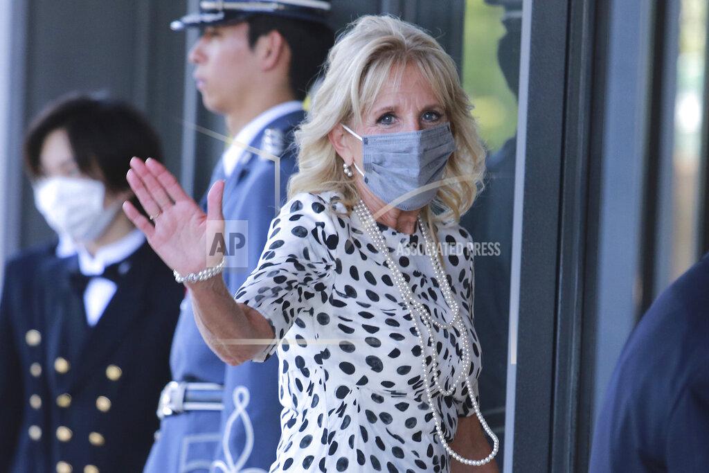 Koji Sasahara U.S. first lady Jill Biden waves as she arrives at Imperial Palace to meet Japan's Emperor Naruhito in Tokyo, Friday, July 23, 2021. (AP Photo/Koji Sasahara, Pool)