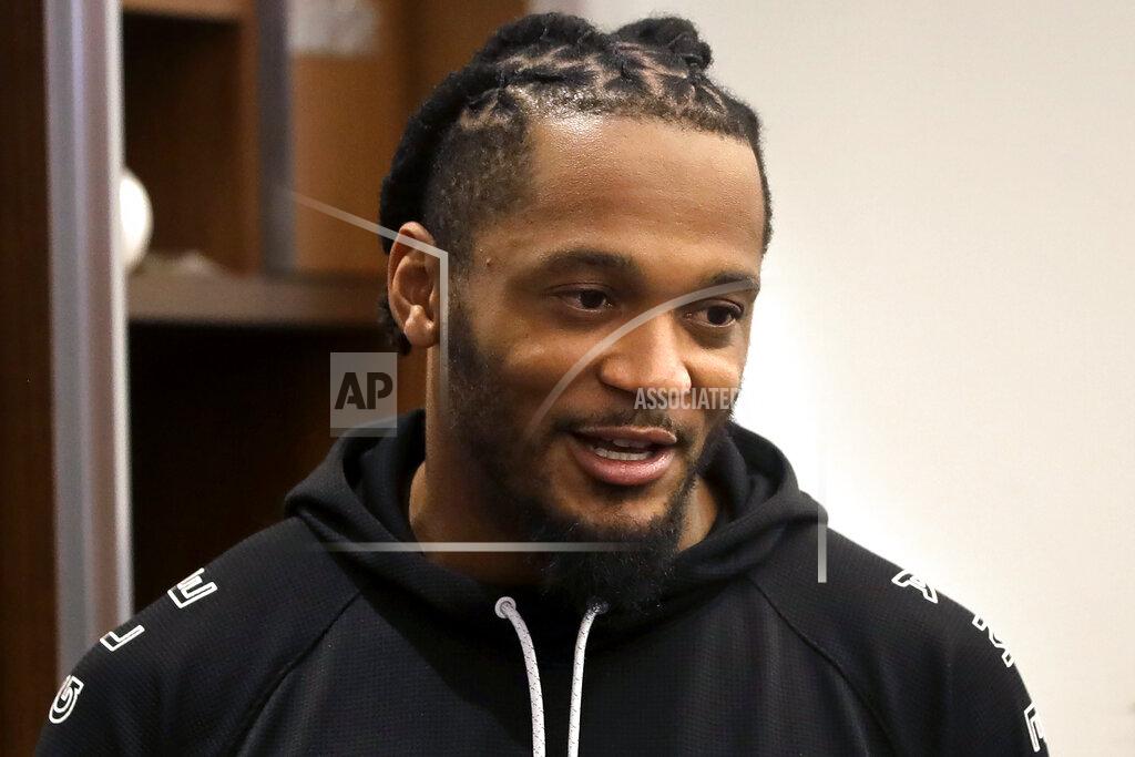 Steven Senne New England Patriots strong safety Patrick Chung speaks with a reporter in the team's locker room following an NFL football practice Monday, Aug. 26, 2019, in Foxborough, Mass. (AP Photo/Steven Senne)
