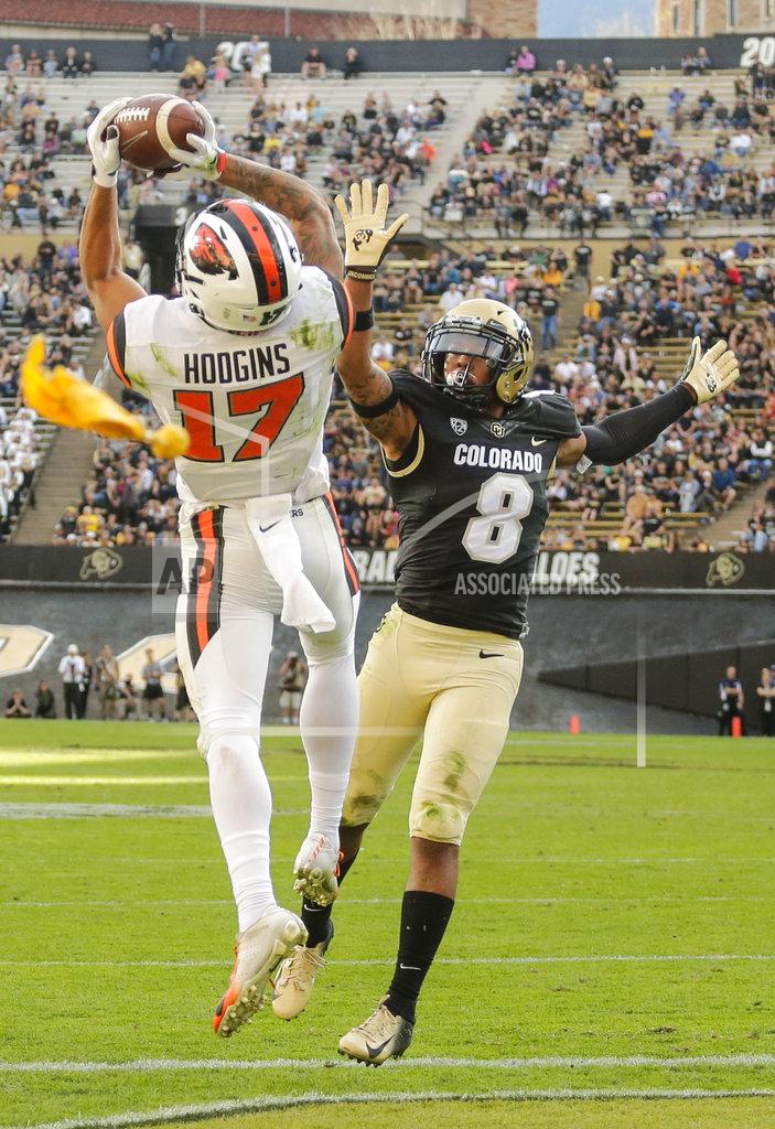 Jack Dempsey Oregon State wide receiver Isaiah Hodgins (17) catches a pass for an extra point conversion against Colorado defensive back Trey Udoffia (8) during the second half of an NCAA college football game, Saturday, Oct. 27, 2018, in Boulder, Colo. (AP Photo/Jack Dempsey)
