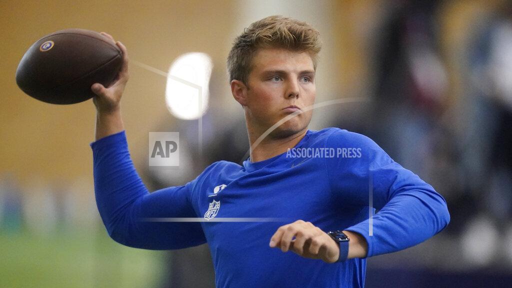 Rick Bowmer BYU quarterback Zach Wilson warms up before participating in the school's pro day football workout for NFL scouts Friday, March 26, 2021, in Provo, Utah. (AP Photo/Rick Bowmer)