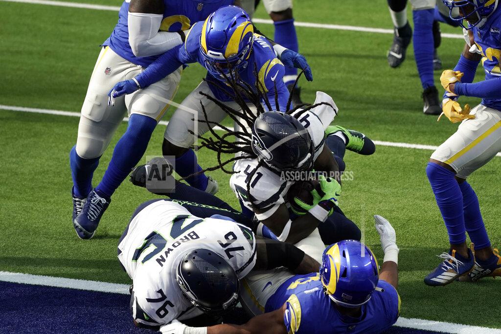 Jae C. Hong Seattle Seahawks running back Alex Collins (41) lunges into the end zone for a touchdown during the first half of an NFL football game against the Los Angeles Rams Sunday, Nov. 15, 2020, in Inglewood, Calif. (AP Photo/Jae C. Hong)