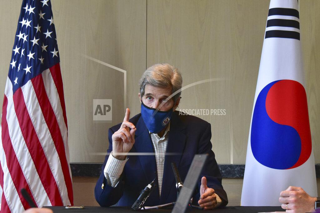 Uncredited FILE - In this Sunday, April 18, 2021, file, photo provided by U.S. Embassy Seoul, U.S. special envoy for climate John Kerry speaks during a round table meeting with the media in Seoul, South Korea. Diplomats for the U.S. and China agreed to cooperate on climate change leading up to the virtual summit that begins on Earth Day. The agreement was reached by U.S. special envoy for climate Kerry and his Chinese counterpart Xie Zhenhua during two days of talks in Shanghai last week. (U.S. Embassy Seoul via AP, File)