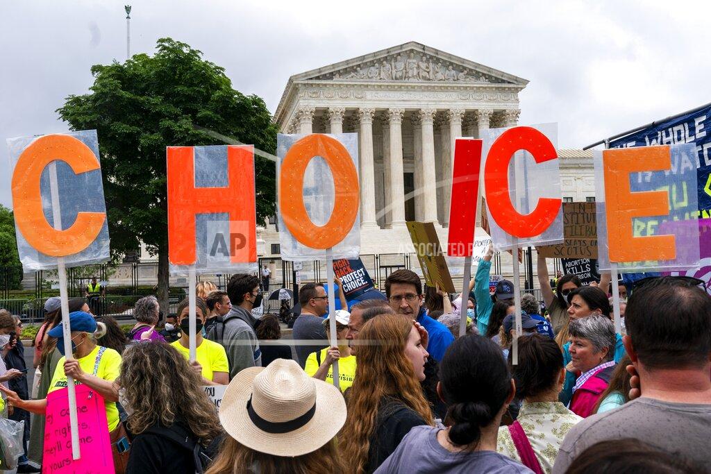 Jacquelyn Martin Abortion-rights demonstrators hold up letters spelling out "My Choice," Saturday, May 14, 2022, outside the Supreme Court in Washington. (AP Photo/Jacquelyn Martin)
