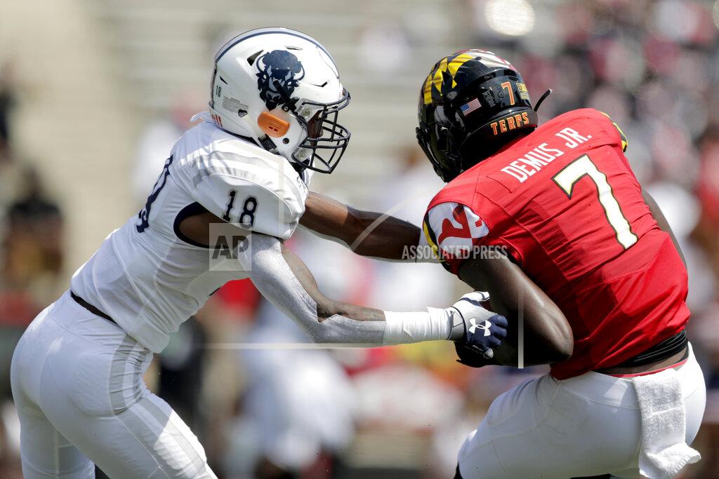 Julio Cortez Maryland wide receiver Dontay Demus Jr. (7) catches a touchdown pass from quarterback Josh Jackson as Howard defensive back Jalen Smith defends during the first half of an NCAA college football game, Saturday, Aug. 31, 2019, in College Park, Md. (AP Photo/Julio Cortez)