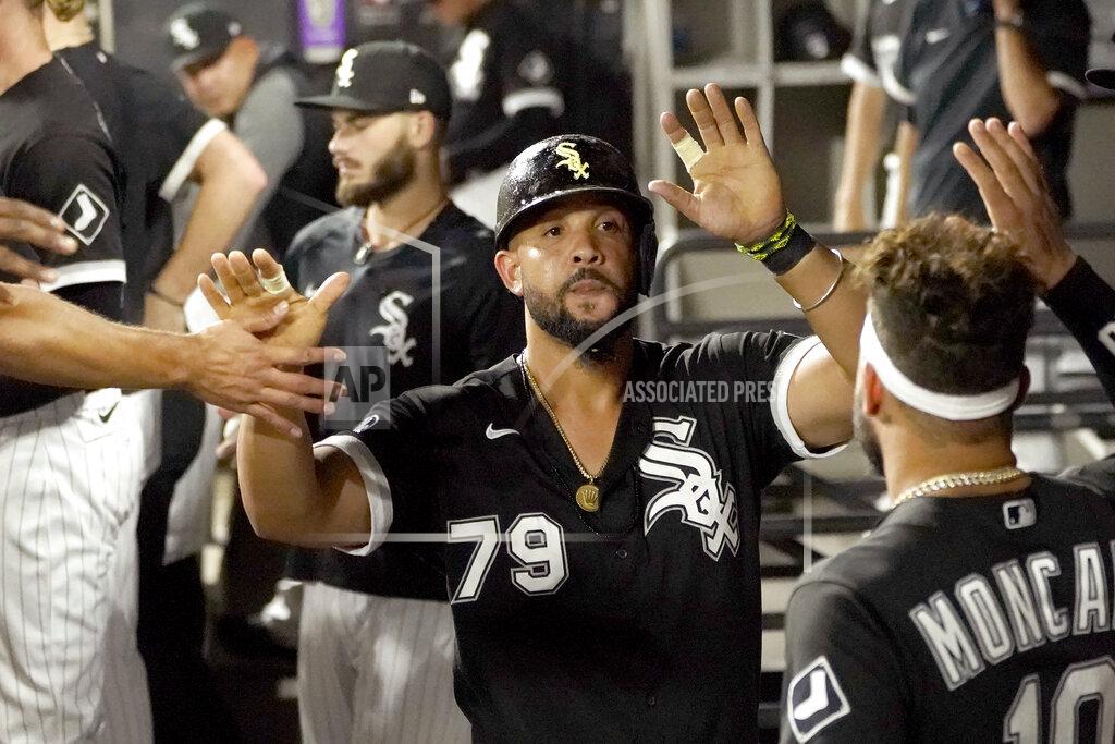 Charles Rex Arbogast Chicago White Sox's Jose Abreu is greeted in the dugout after he scored on a bases loaded walk by Pittsburgh Pirates relief pitcher Chasen Shreve during the sixth inning of a baseball game Tuesday, Aug. 31, 2021, in Chicago. (AP Photo/Charles Rex Arbogast)