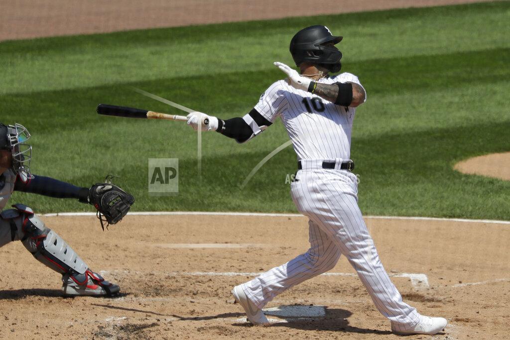 Nam Y. Huh Chicago White Sox's Yoan Moncada hits a one-run double during the third inning of a baseball game against the Minnesota Twins in Chicago, Saturday, July 25, 2020. (AP Photo/Nam Y. Huh)