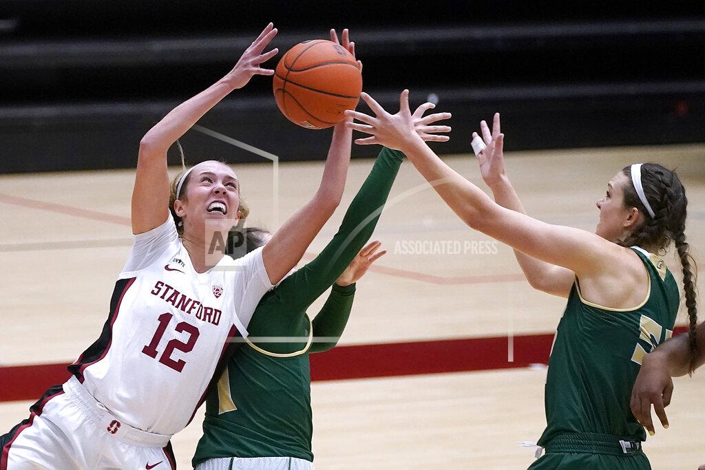 Tony Avelar Stanford guard Lexie Hull (12) battles for a rebound against Cal Poly guard Abbey Ellis, center, and Sierra Campisano, right, during the first half of an NCAA college basketball game in Stanford, Calif., Wednesday, Nov. 25, 2020. (AP Photo/Tony Avelar)
