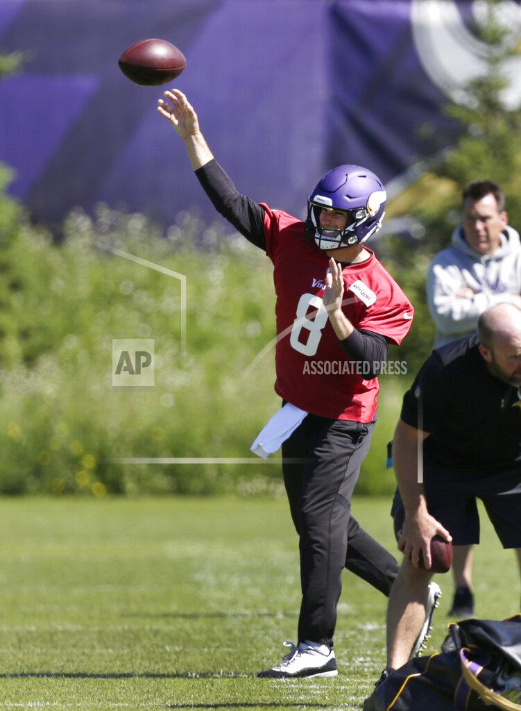 Andy Clayton-King Minnesota Vikings quarterback Kirk Cousins throws during drills at the team's NFL football training facility in Eagan, Minn., Thursday, June 13, 2019. (AP Photo/Andy Clayton- King)