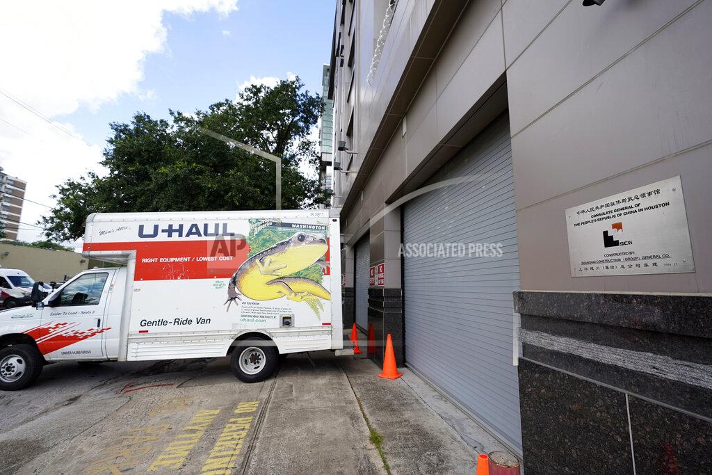 David J. Phillip A moving truck sits outside the Chinese Consulate Thursday, July 23, 2020, in Houston. China says “malicious slander" is behind an order by the U.S. government to close its consulate in Houston, and maintains that its officials have never operated outside ordinary diplomatic norms. (AP Photo/David J. Phillip)