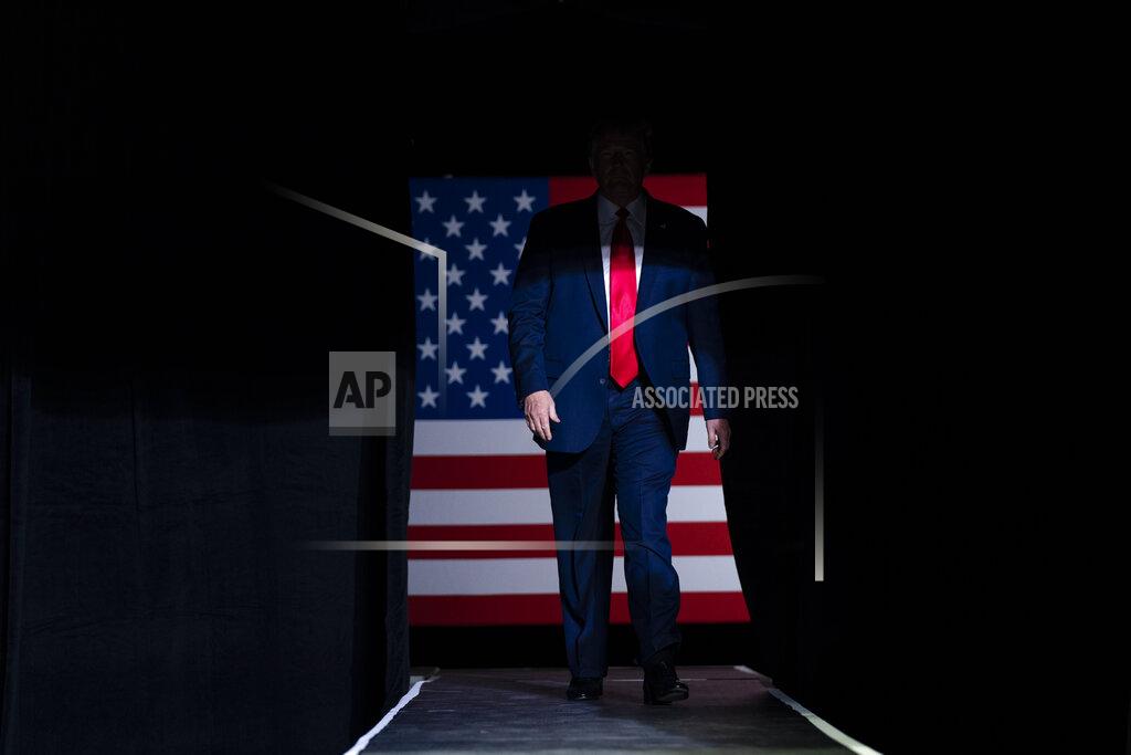 Evan Vucci President Donald Trump arrives on stage to speak at a campaign rally at the BOK Center, Saturday, June 20, 2020, in Tulsa, Okla. (AP Photo/Evan Vucci)
