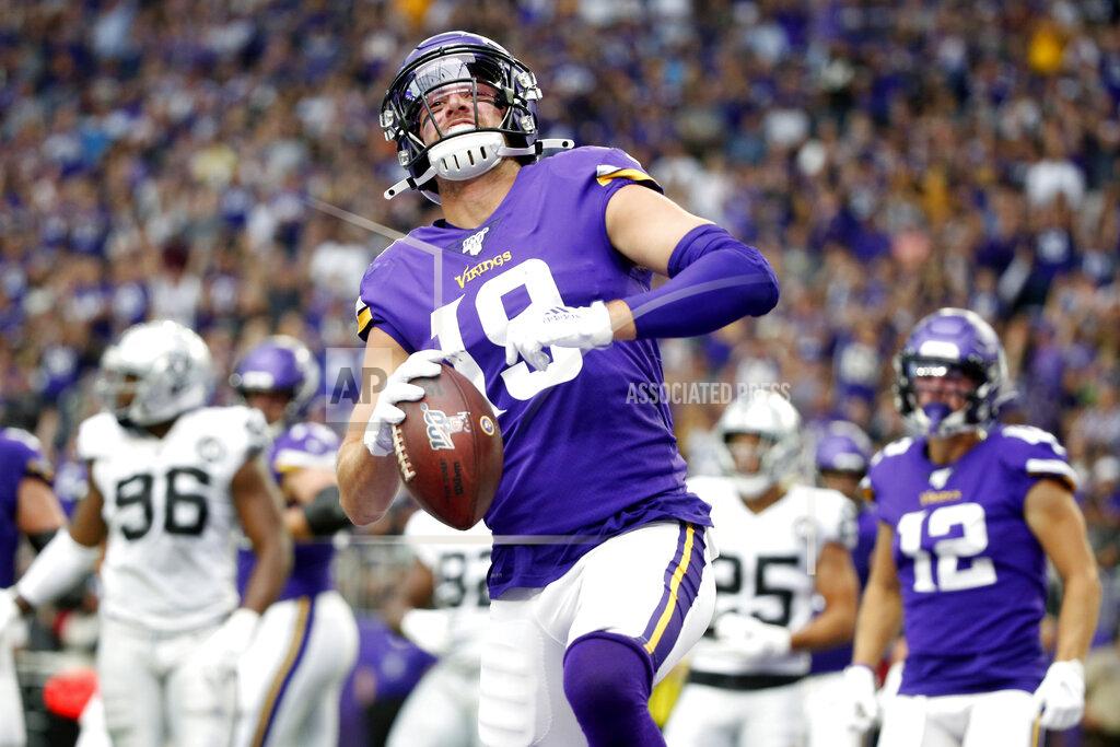 Bruce Kluckhohn Minnesota Vikings wide receiver Adam Thielen celebrates after scoring on a 1-yard touchdown run during the first half of an NFL football game against the Oakland Raiders, Sunday, Sept. 22, 2019, in Minneapolis. (AP Photo/Bruce Kluckhohn)