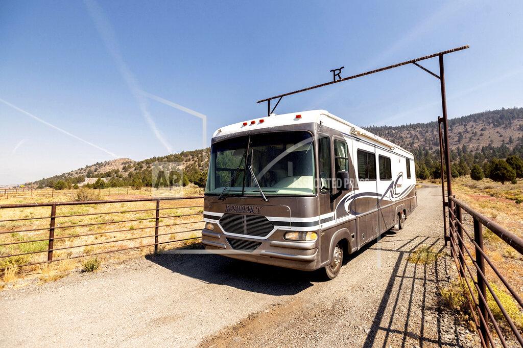 Noah Berger Woody Faircloth drives a donated RV while delivering it to Dixie Fire victim John Hunter, Sunday, Sept. 5, 2021, in Sierra County, Calif. (AP Photo/Noah Berger)