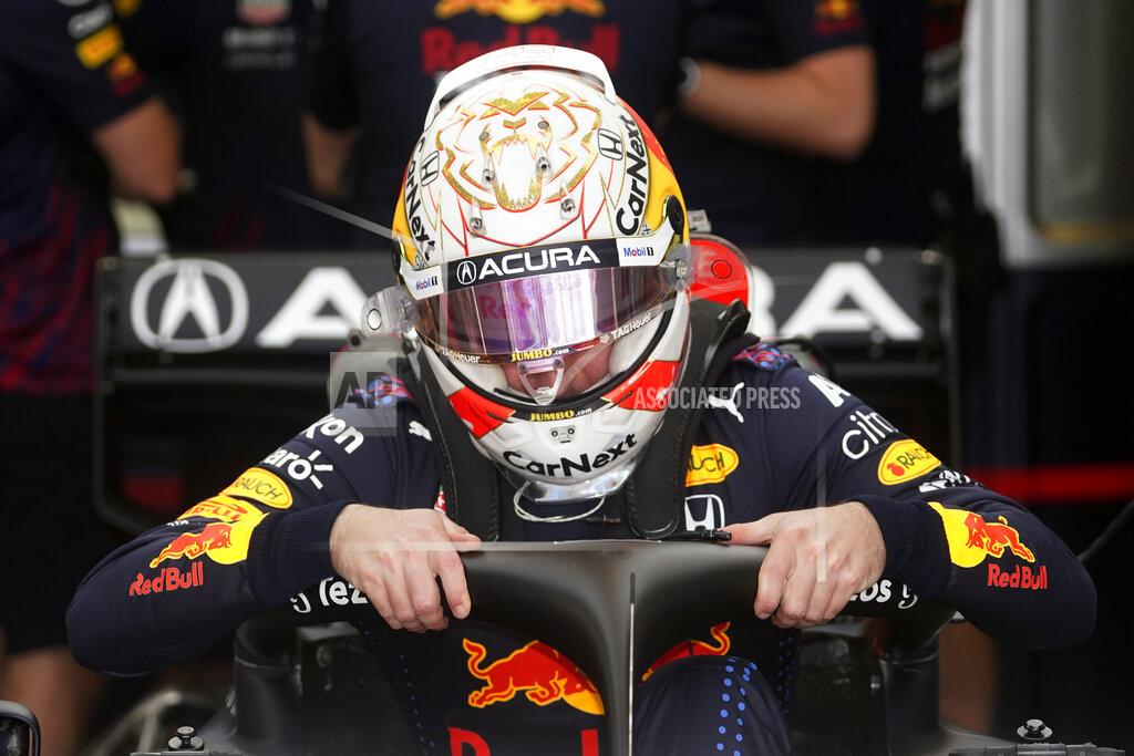 Darron Cummings Red Bull driver Max Verstappen, of the Netherlands, climbs into his car during a practice session for the Formula One U.S. Grand Prix auto race at the Circuit of the Americas, Saturday, Oct. 23, 2021, in Austin, Texas. (AP Photo/Darron Cummings)
