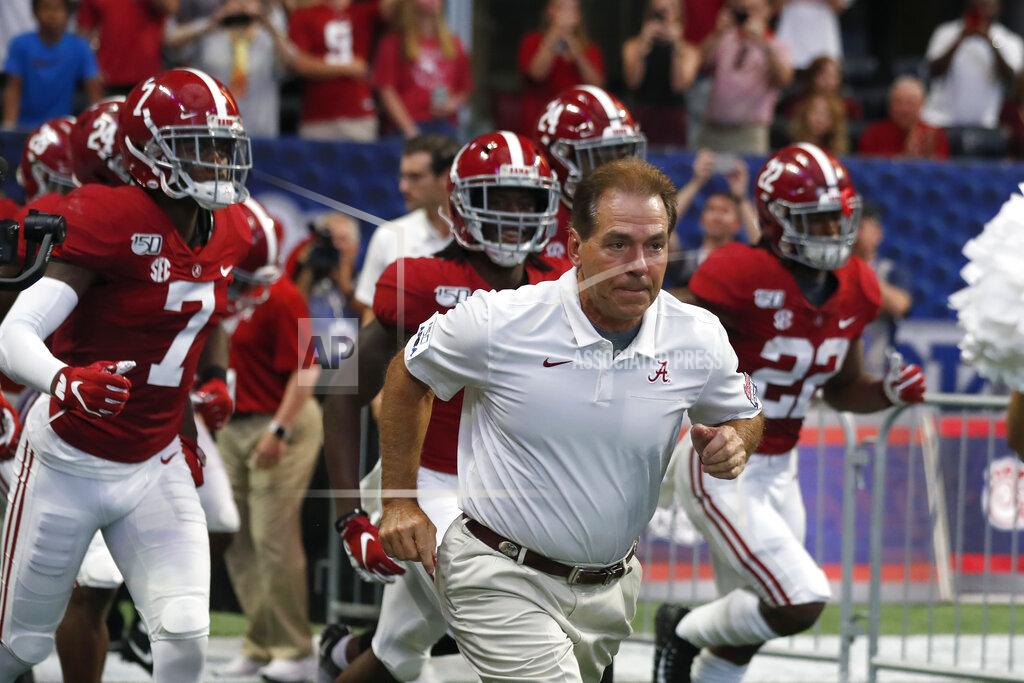 John Bazemore FILE - In this Aug. 31, 2019, file photo, Alabama head coach Nick Saban leads his team onto the field for a an NCAA college football game against Duke, in Atlanta. For the first time in college football history, there will be two games matching teams of at least 8-0 on the same day, according to ESPN Facts and Info.
In Tuscaloosa, Alabama, LSU and the Crimson Tide will play the first regular-season game matching AP Nos. 1 and 2 since 2011 _ when No. 1 LSU beat No. 2 Alabama 9-6 in overtime. (AP Photo/John Bazemore, File)