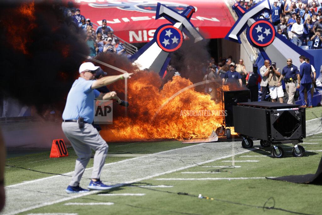 James Kenney A fire from a pyrotechnics machine burns on the field before an NFL football game between the Tennessee Titans and the Indianapolis Colts Sunday, Sept. 15, 2019, in Nashville, Tenn. (AP Photo/James Kenney)