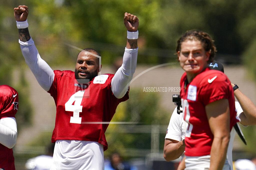 Ashley Landis Dallas Cowboys quarterback Dak Prescott (4) and Los Angeles Chargers quarterback Justin Herbert (10) participate in drills during a combined NFL practice at the Los Angeles Rams' practice facility in Costa Mesa, Calif. Thursday, Aug. 18, 2022. (AP Photo/Ashley Landis)
