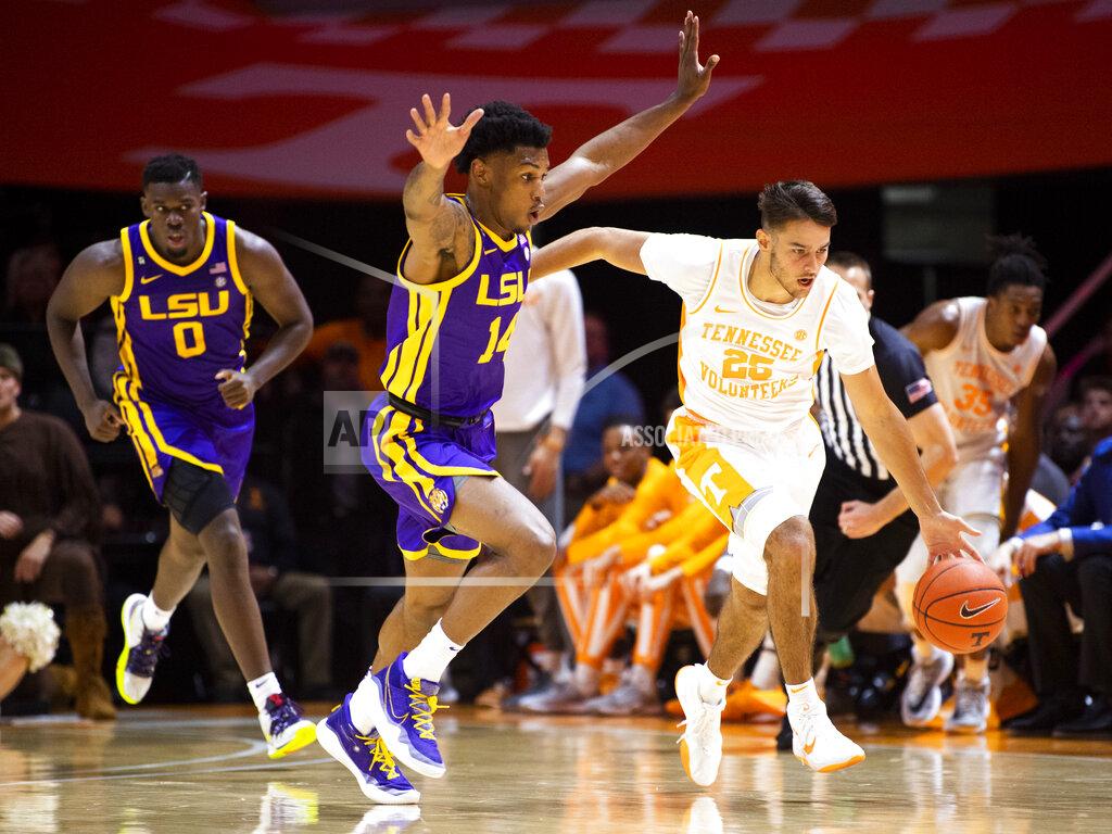 Brianna Paciorka Tennessee guard Santiago Vescovi (25) drives past LSU guard Marlon Taylor (14) during an NCAA college basketball game at Thompson-Boling Arena, Saturday, Jan. 4, 2020, Knoxville, Tenn. (Brianna Paciorka//Knoxville News Sentinel via AP)