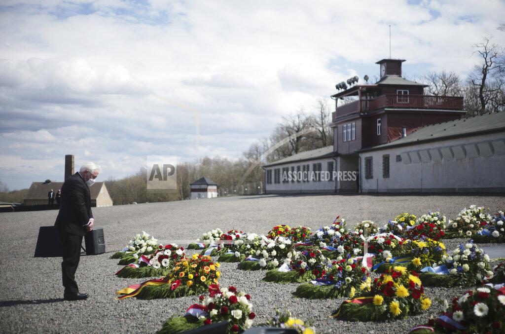 Markus Schreiber German President Frank-Walter Steinmeier lays down a wreath during commemorations marking the 76th anniversary of the liberation of the Nazi concentration camp Buchenwald near Weimar, Germany, Sunday, April 11, 2021. On April 11, 1945 the US Army liberated the concentration camp Buchenwald. (AP Photo/Markus Schreiber)