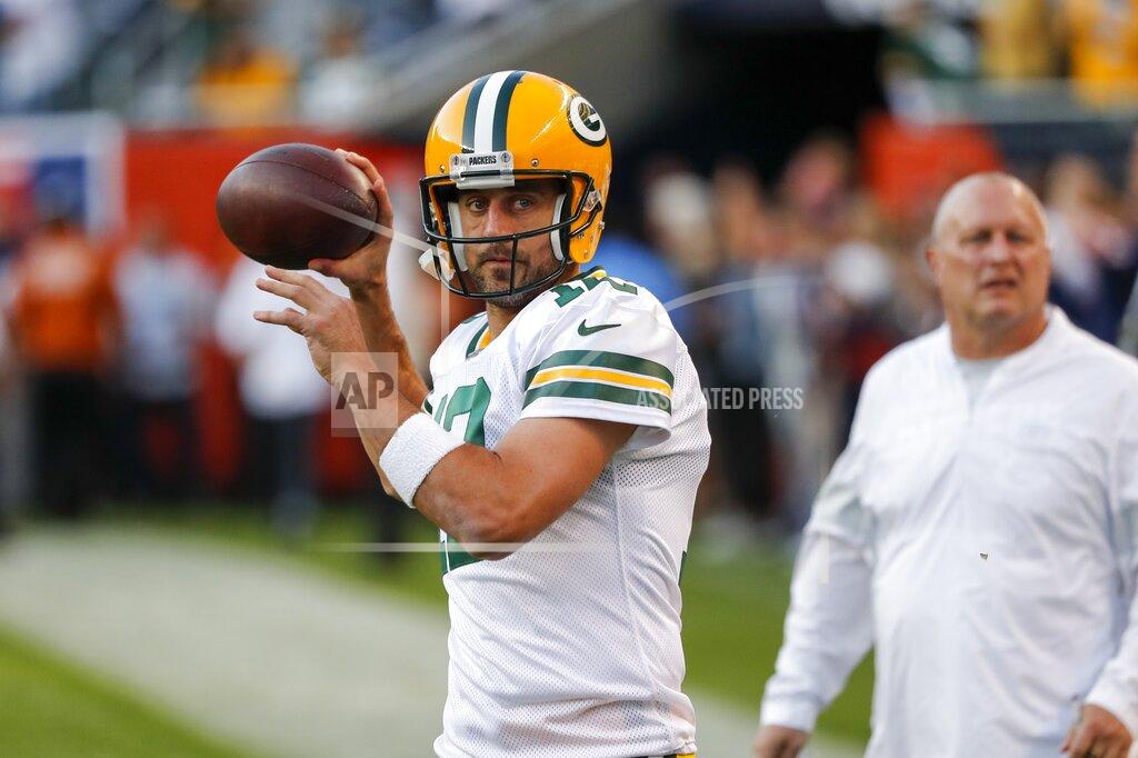 Charles Rex Arbogast Green Bay Packers' Aaron Rodgers warms up before an NFL football game against the Chicago Bears Thursday, Sept. 5, 2019, in Chicago. (AP Photo/Charles Rex Arbogast)