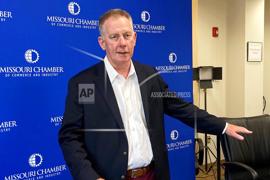 David A. Lieb Dan Mehan, president and CEO of the Missouri Chamber of Commerce and Industry, stands against a backdrop that the chamber has used for virtual meetings during the coronavirus pandemic at its office in Jefferson City, Missouri, on May 24, 2021. The chamber supported Gov. Mike Parson's decision to use $300 million of federal coronavirus relief funds to shore up the state's unemployment insurance trust fund. (AP Photo/David A. Lieb)