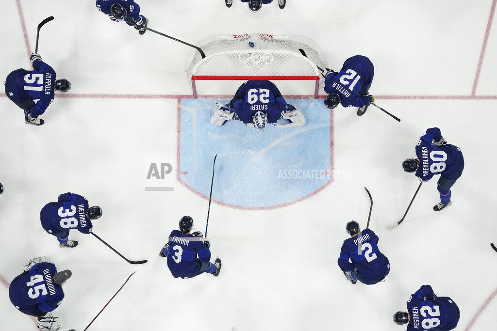 Petr David Josek Finland gathers before the men's gold medal hockey game against Russian Olympic Committee at the 2022 Winter Olympics, Sunday, Feb. 20, 2022, in Beijing. (AP Photo/Petr David Josek)