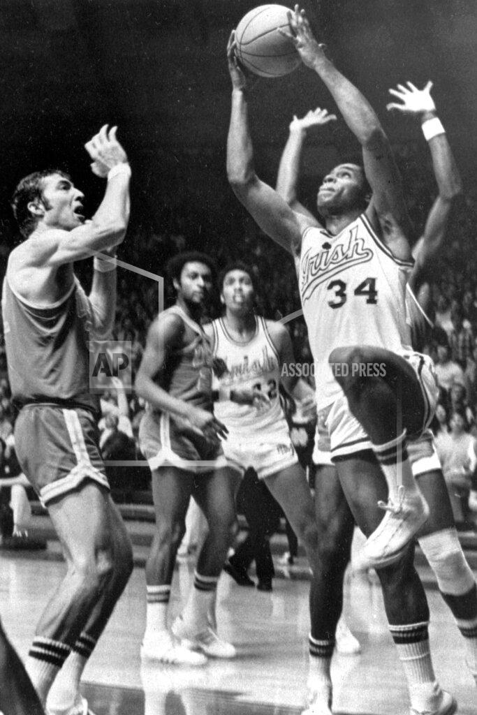 Richard Horowitz FILE - In this Jan. 23, 1971, file photo, Notre Dame's Austin Carr goes to the basket as UCLA's Steve Patterson, left, defends, during a college basketball game in South Bend, Ind. Carr had 46 points in an 89-82 victory. Carr played for Notre Dame in an era when prolific scorers dominated college basketball. It wasn't until Carr scored a still-standing NCAA Tournament-record 61 points against Ohio in the first round in 1970 that, in his mind, he started to separate himself. (AP Photo/Richard Horowitz, File)