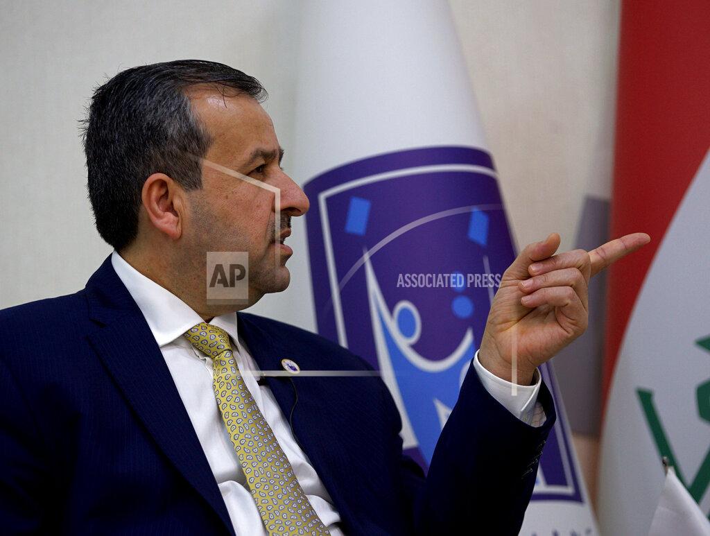 Hadi Mizban Judge Jaleel Adnan Khalaf, chairman of the Iraqi Independent High Electoral Commission, speaks during an interview with The Associated Press, Tuesday, Sept. 14, 2021, in Baghdad, Iraq. Iraq has identified and thwarted attempts of voter fraud less than one month before Iraq is set to hold federal polls including the selling of votes and intimidation using arms, the head of Iraq's electoral commission said. (AP Photo/Hadi Mizban)