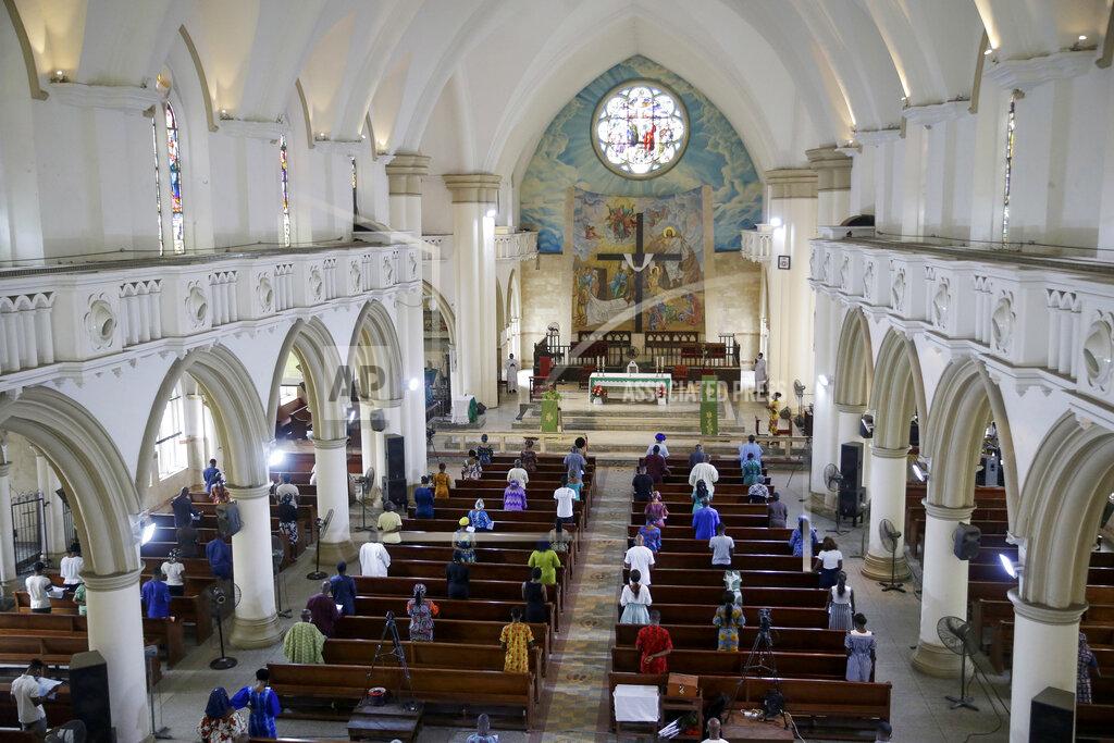 Sunday Alamba The congregation practises social-distancing to curb the spread of the coronavirus during a Sunday mass at the Holy Cross Cathedral in Lagos, Nigeria Sunday, Aug. 30, 2020. The COVID-19 pandemic is testing the patience of some religious leaders across Africa who worry they will lose followers, and funding, as restrictions on gatherings continue. (AP Photo/Sunday Alamba)