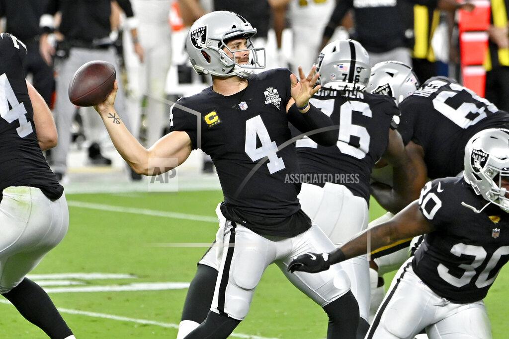 David Becker Las Vegas Raiders quarterback Derek Carr (4) throws against the New Orleans Saints during the second half of an NFL football game, Monday, Sept. 21, 2020, in Las Vegas. (AP Photo/David Becker)