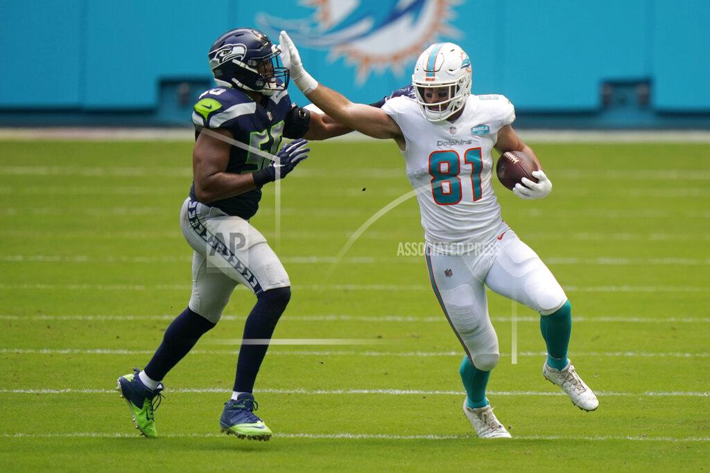 Lynne Sladky Miami Dolphins tight end Durham Smythe (81) blocks Seattle Seahawks outside linebacker K.J. Wright (50), during the first half of an NFL football game, Sunday, Oct. 4, 2020, in Miami Gardens, Fla. (AP Photo/Lynne Sladky)